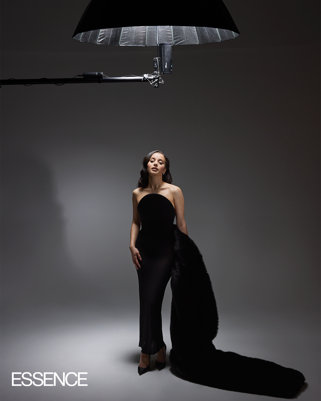 Chase Infiniti in black, ESSENCE editorial